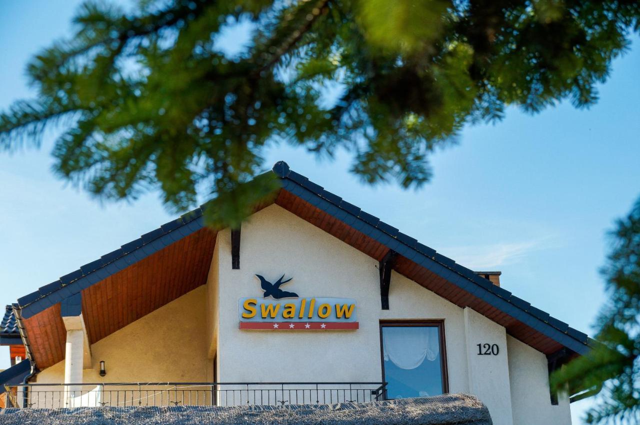 Appartement Osrodek Wypoczynkowy Swallow à Grzybowo  Extérieur photo