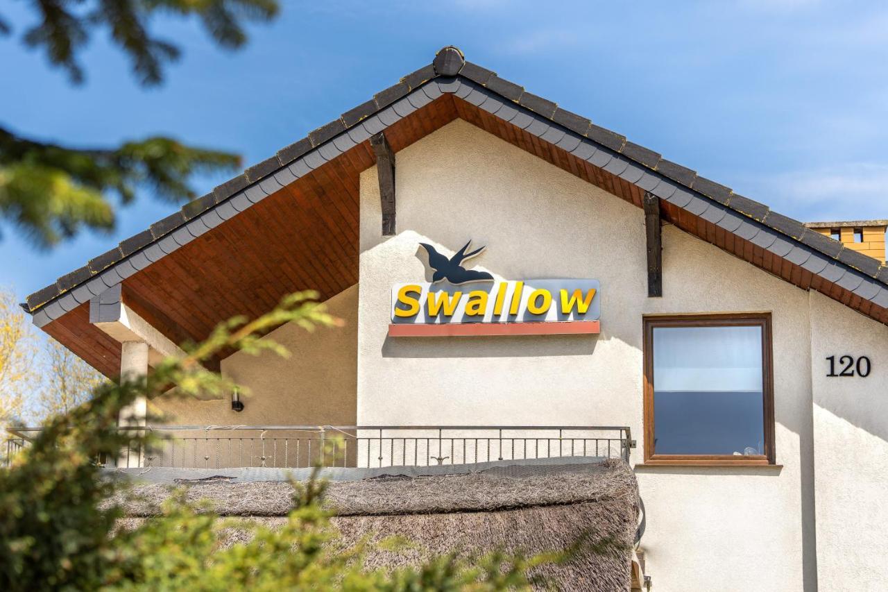 Appartement Osrodek Wypoczynkowy Swallow à Grzybowo  Extérieur photo