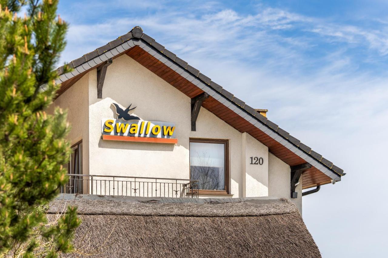 Appartement Osrodek Wypoczynkowy Swallow à Grzybowo  Extérieur photo