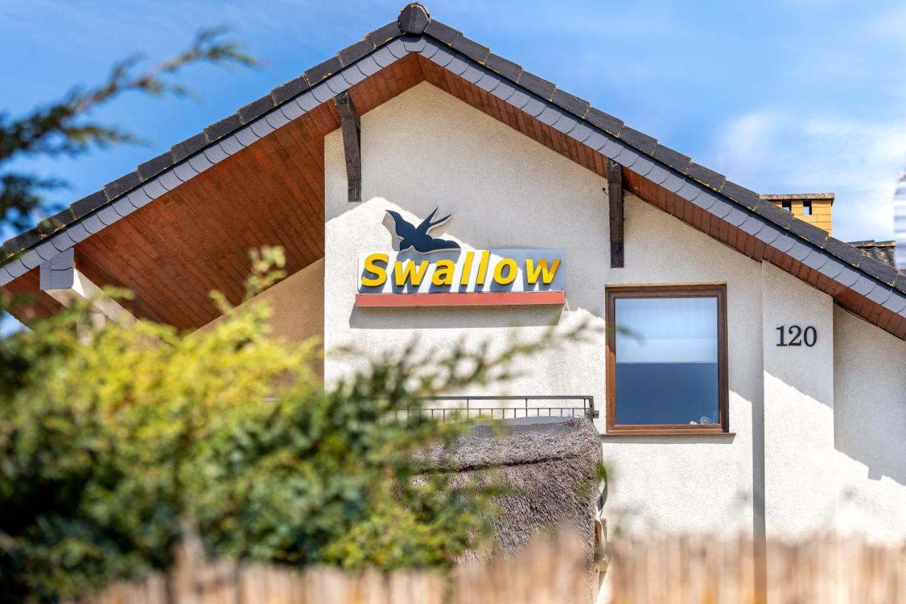 Appartement Osrodek Wypoczynkowy Swallow à Grzybowo  Extérieur photo